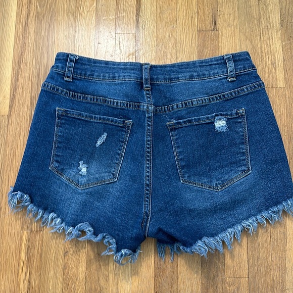 Women’s blue denim distressed jean shorts - Picture 6 of 16